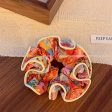 Wholesale of Colored Bear Floral Fabrics Hair Scrunchies on Sale