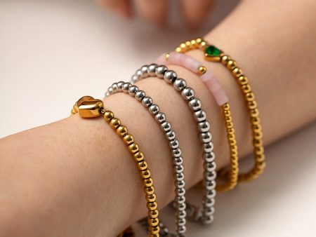 Wholesale Titanium Steel 16k Gold Bead Green Heart Zircon Bracelet Online Hot Sale