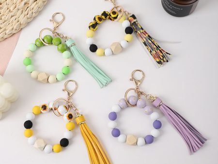 Wholesale Tassel Silicone Wooden Bead Bracelet Keychain Online now