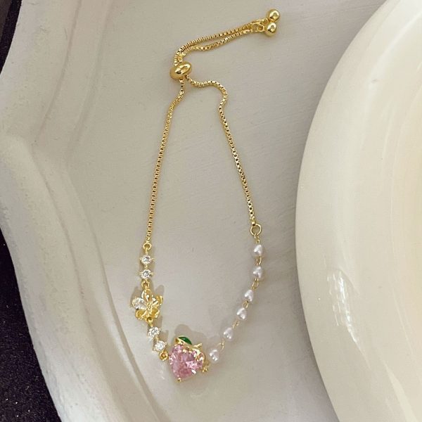 Wholesale Sweet Pink Strawberry Zircon Flower Pearl Metal Bracelet Sale