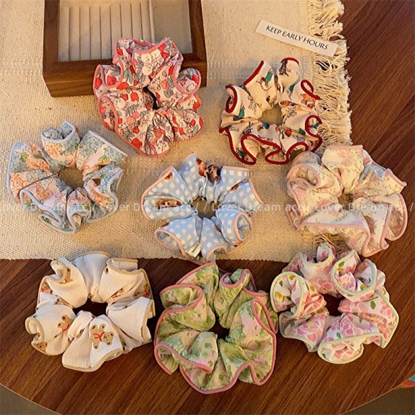 Wholesale of Colored Bear Floral Fabrics Hair Scrunchies on Sale